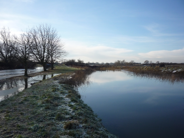 File:Flooded canal and beck - geograph.org.uk - 2202160.jpg