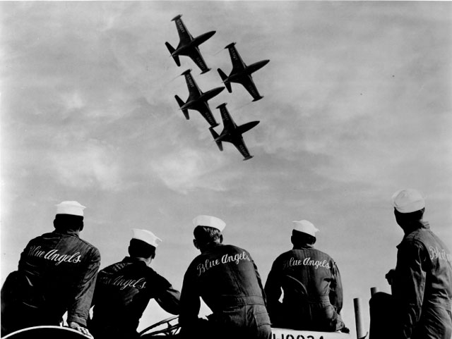 <em>The Blue Angels support crew watches the team fly their Panthers (U.S. Navy)</em>