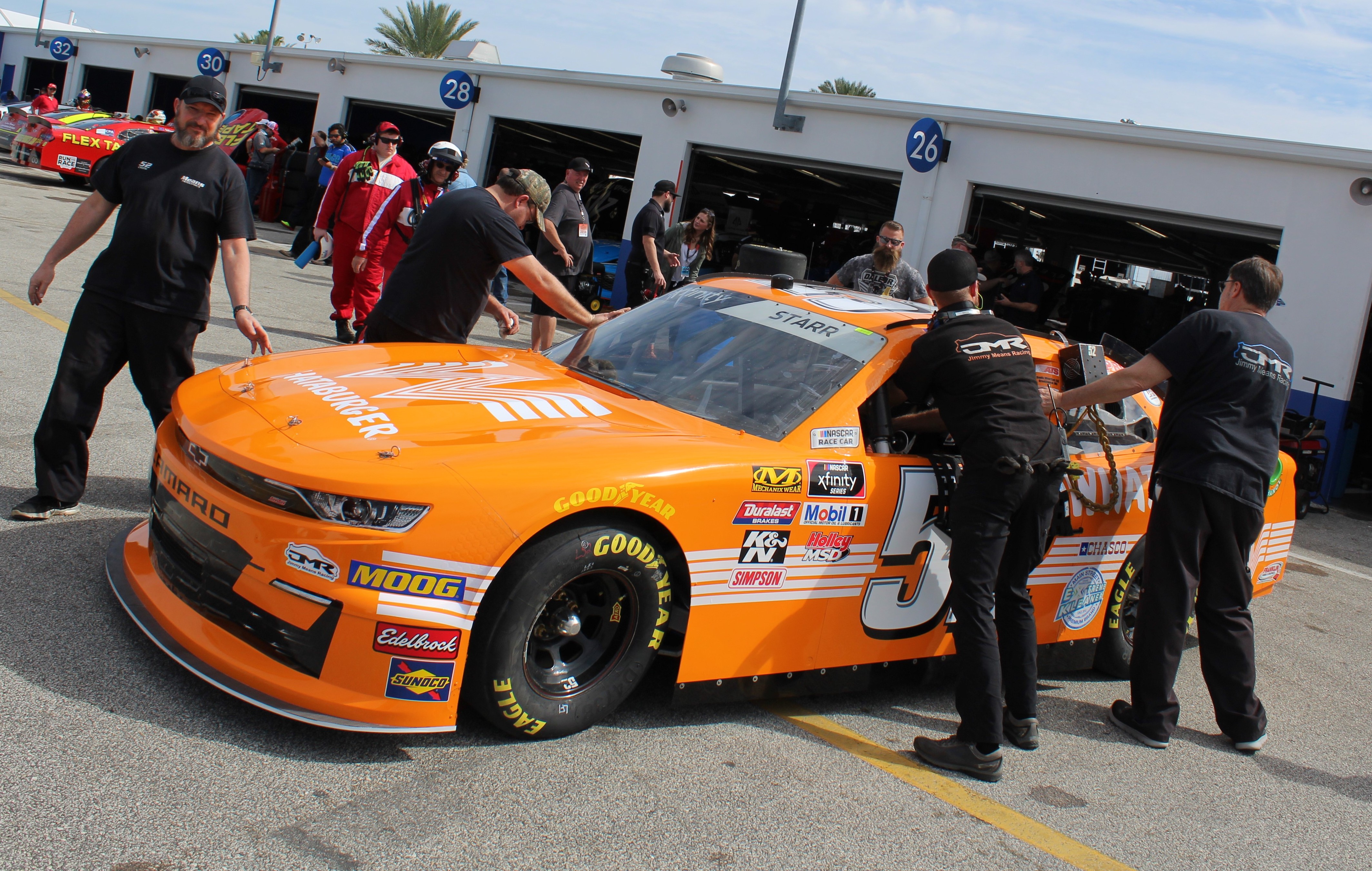 Orange racing. David Starr Alleman.