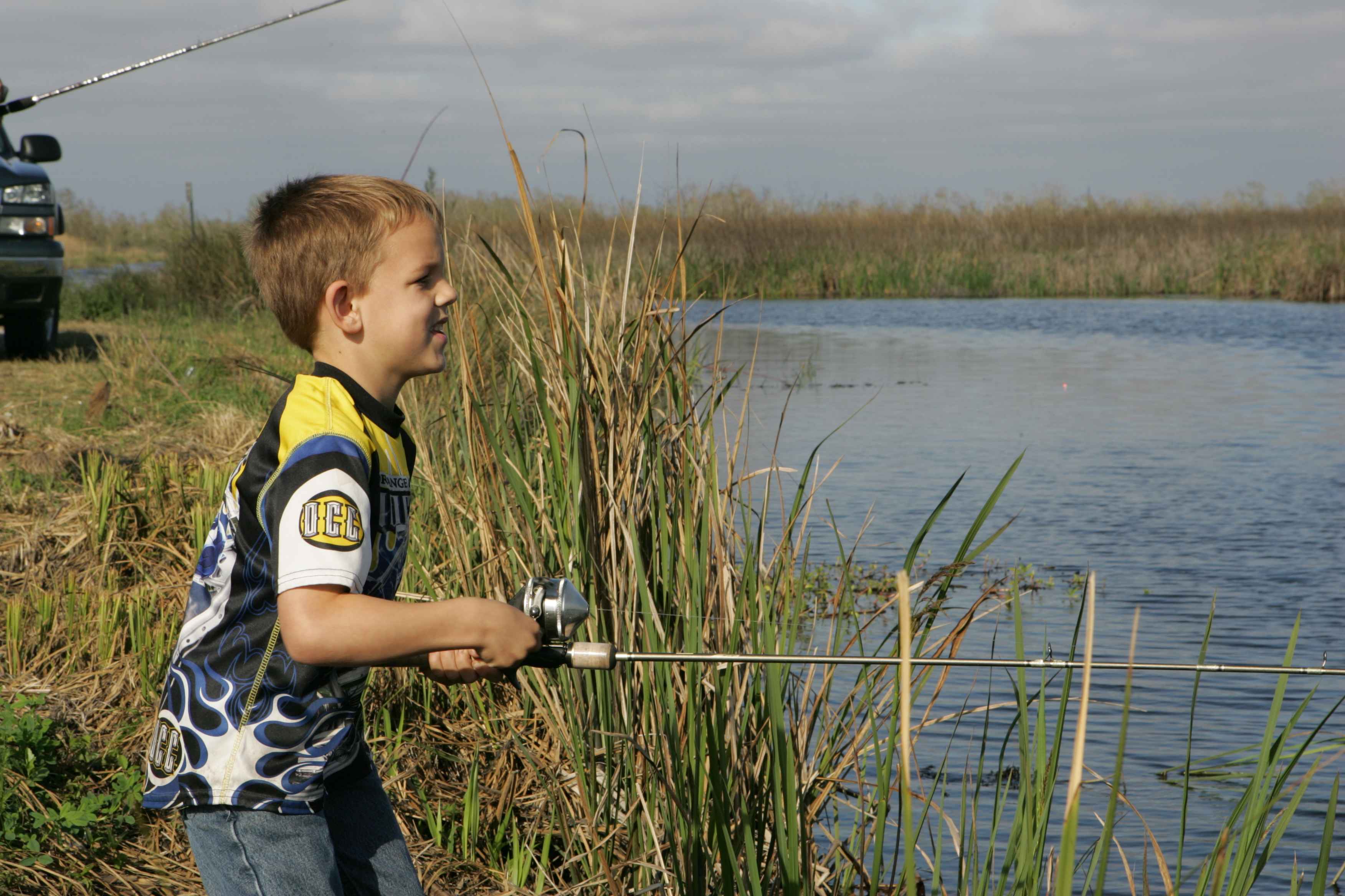 File:A young boy fishing.jpg - Wikimedia Commons