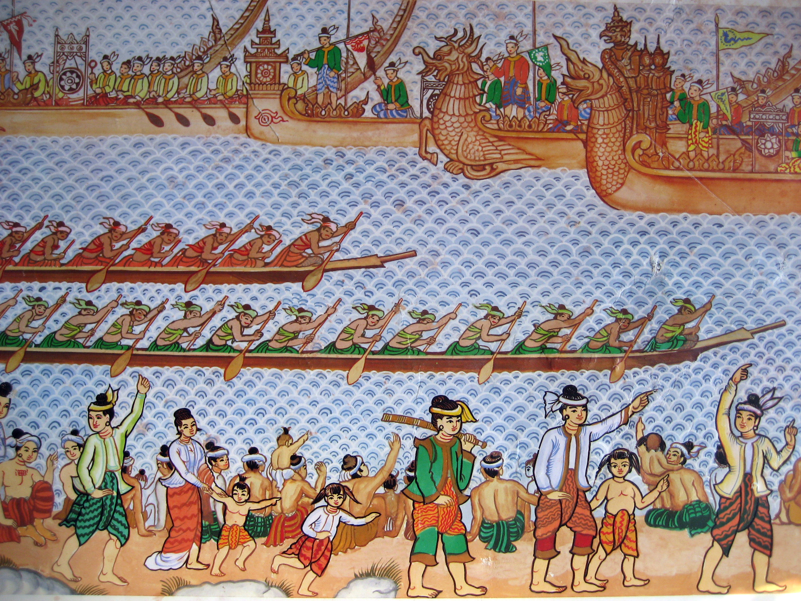 Four rows span this image. The top row is dragon boats racing to the left. The second and third rows are shallow, long canoes racing to the right. The bottom row is of families pacing along the water's edge. 