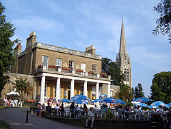 A cafe is housed in the late-18th century mansion; the spire of St Mary's Church, Stoke Newington can be seen in the background Clissold park1.jpg