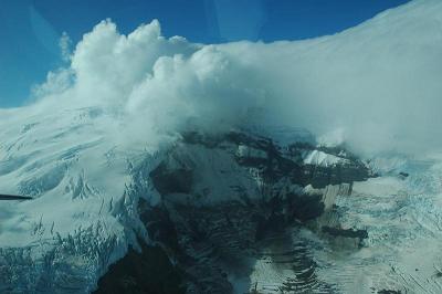 Headwall of Fourpeaked Glacier with steam and volcanic gases rising through vents on Sept. 20, 2006 Fourpeaked-glacier1.JPG