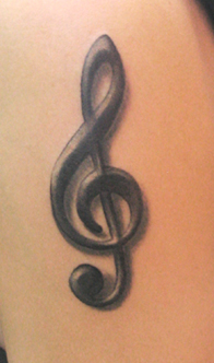 cool treble clef tattoo