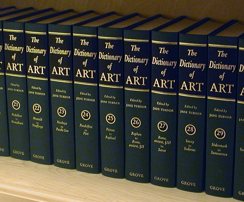 multivolume dictionary of art on a bookshelf