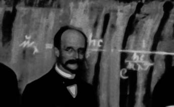 File:1911 Solvay conference Max Planck mit seiner Strahlungsformel (cropped).jpg