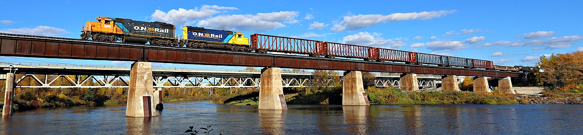 Ontario Northland freight train crossing the Missinaibi River at Mattice-Val Côté in Northern Ontario