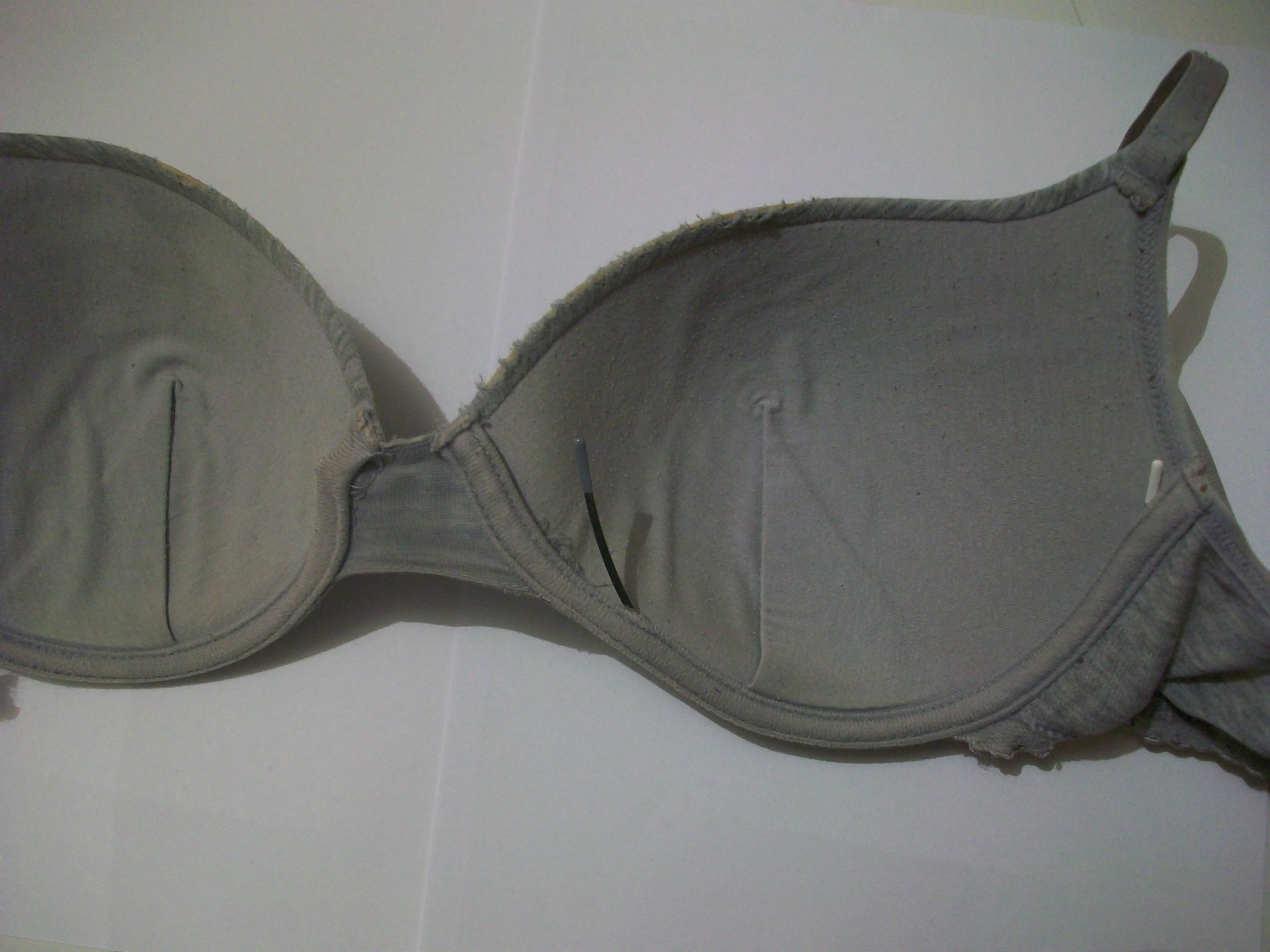 File:Worn bra with protruding metal underwire.jpg - Wikimedia Commons