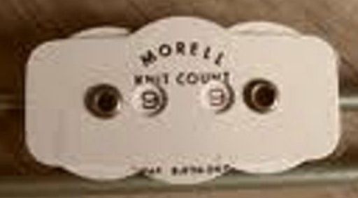 File:Abel Morrell knitting row counter.jpg