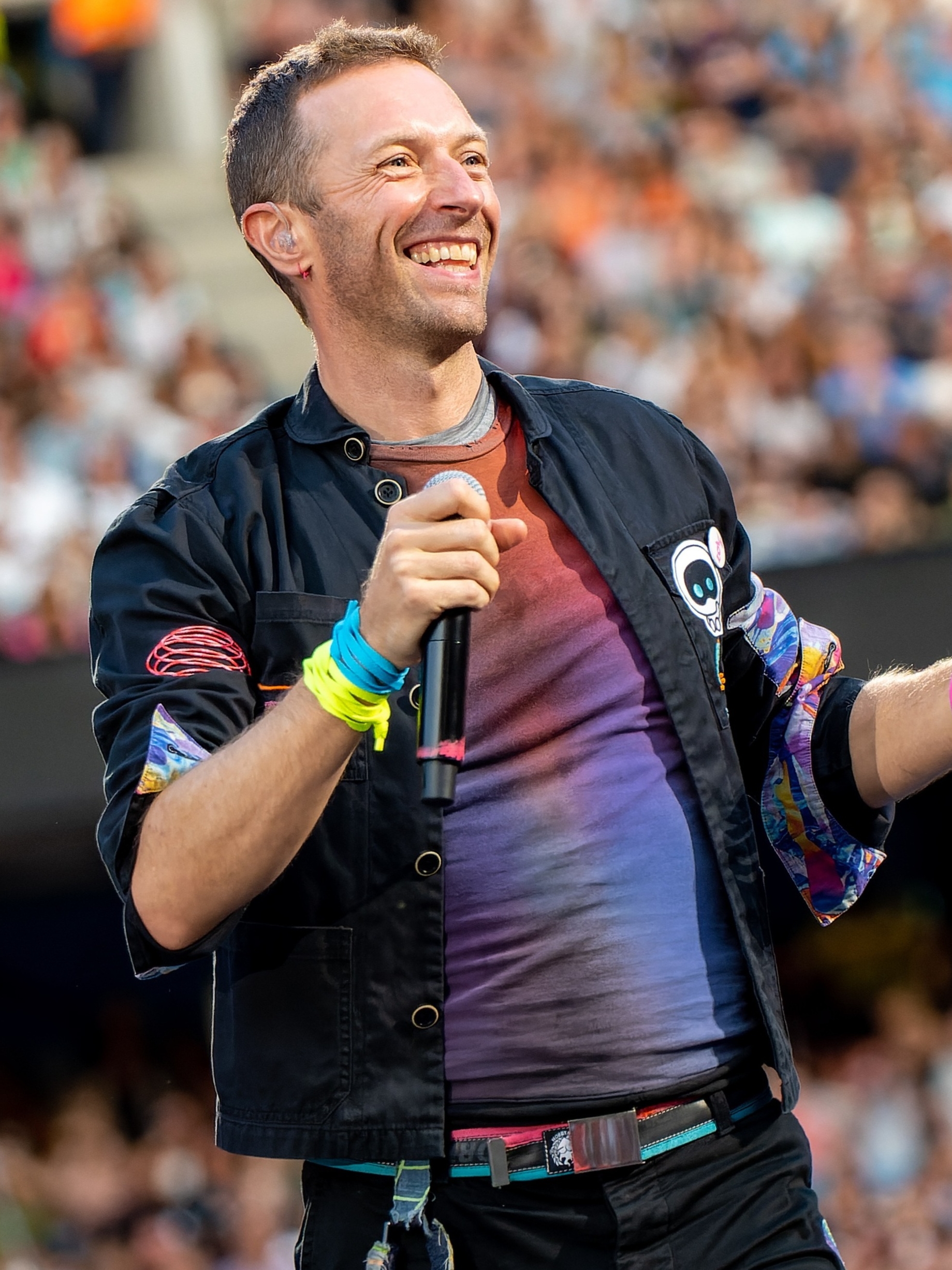 Martin performing with [[Coldplay]] in 2023