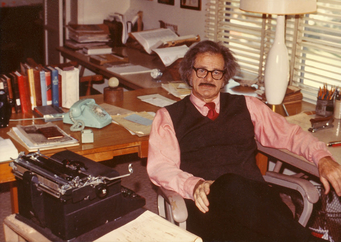 Norman Corwin with typewriter, 1973