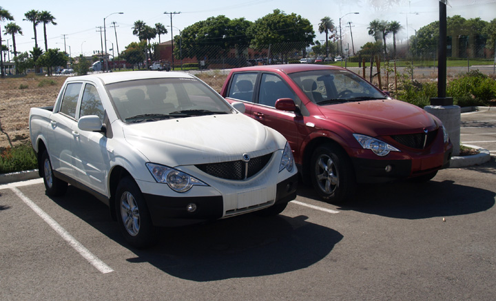 Phoenix Motorcars, Inc. ( E -SUV ) Two_Phoenix_Motorcars_in_parking_lot