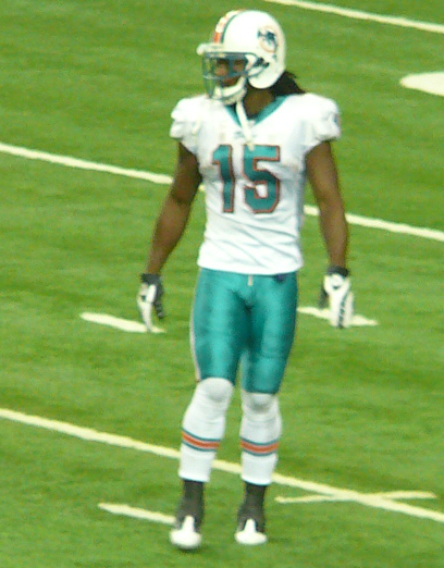 21 December 2008: Dolphins rookie Davone Bess is wrapped up by