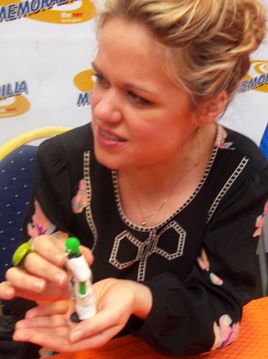 Keenan holding an action figure of her ''[[Doctor Who]]'' character at the Birmingham Memorabilia Convention in 2012