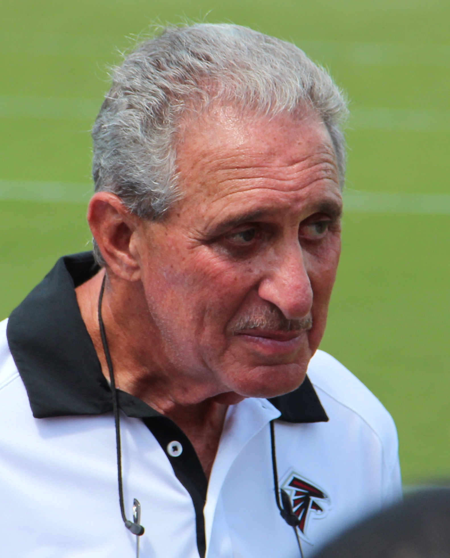 Atlanta Falcons owner Arthur Blank models a new Falcons' jersey