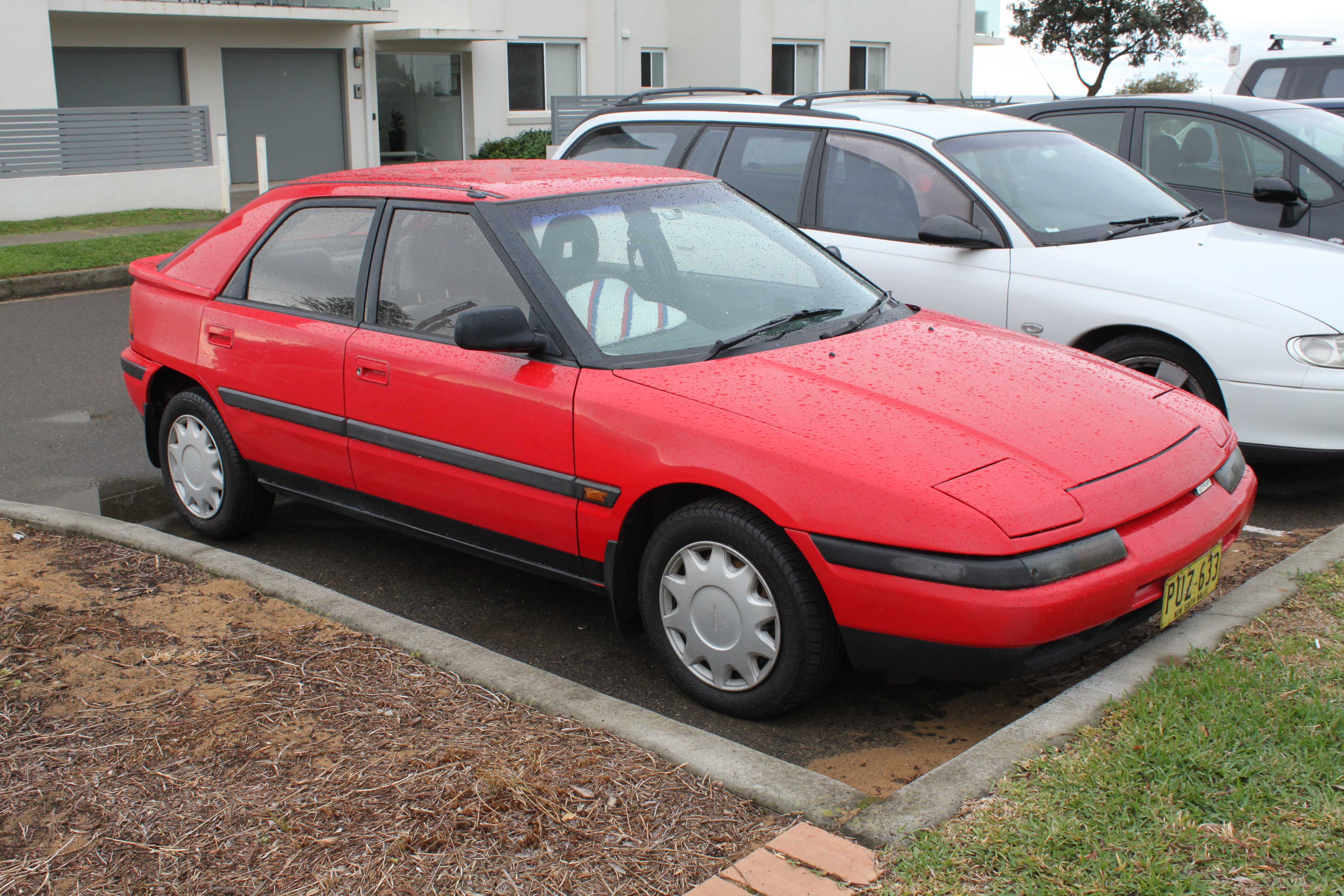 File:1990 Mazda 323 (BG) Astina 5-door hatchback (27760459201).jpg