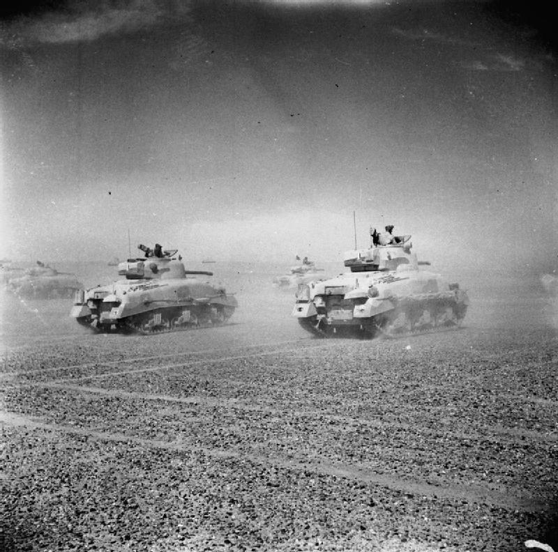 Sherman_tanks_of_the_Eighth_Army_move_across_the_desert.jpg