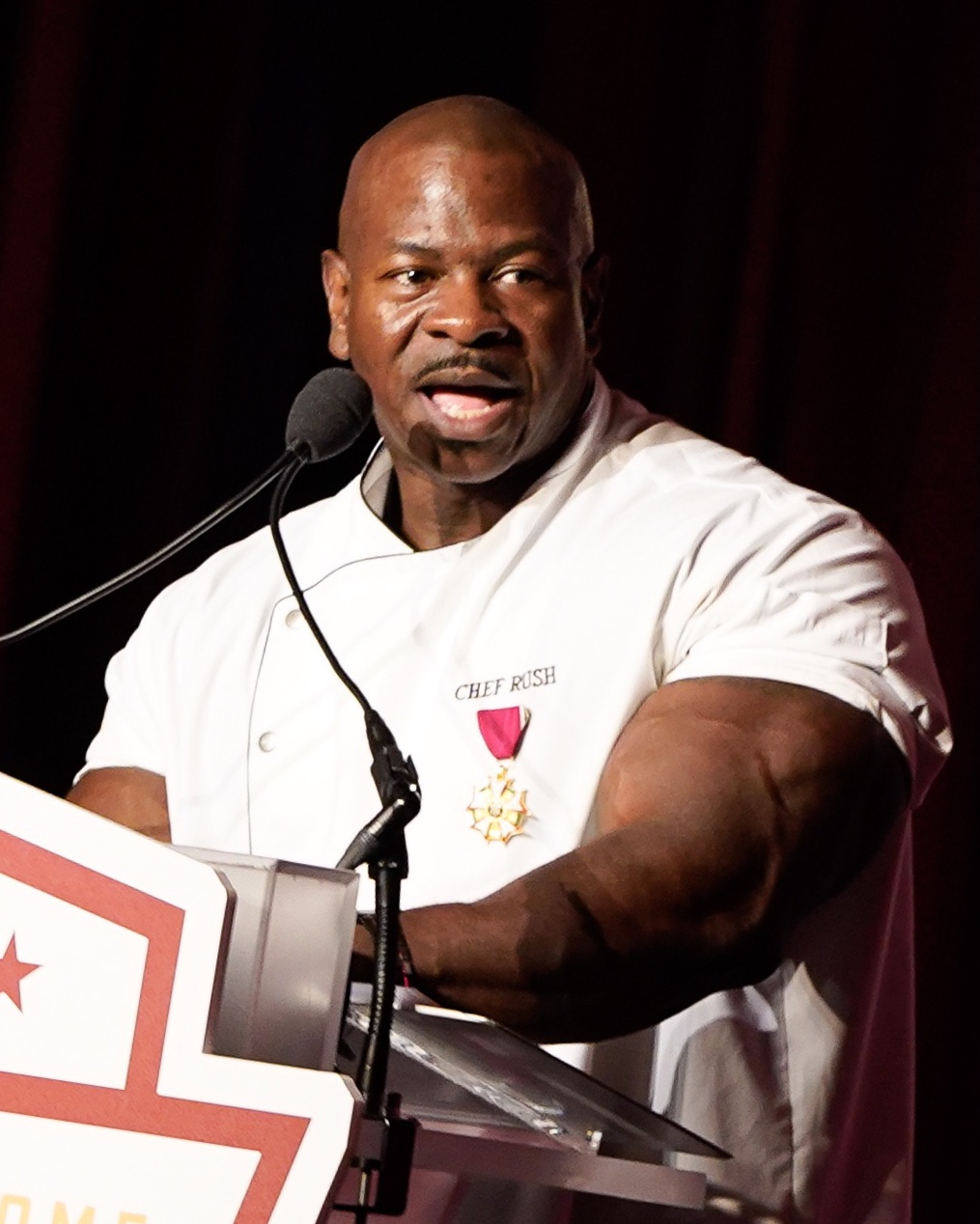 Rush speaking at the [[Washington Redskins]] 58th annual Welcome Home Luncheon in 2019