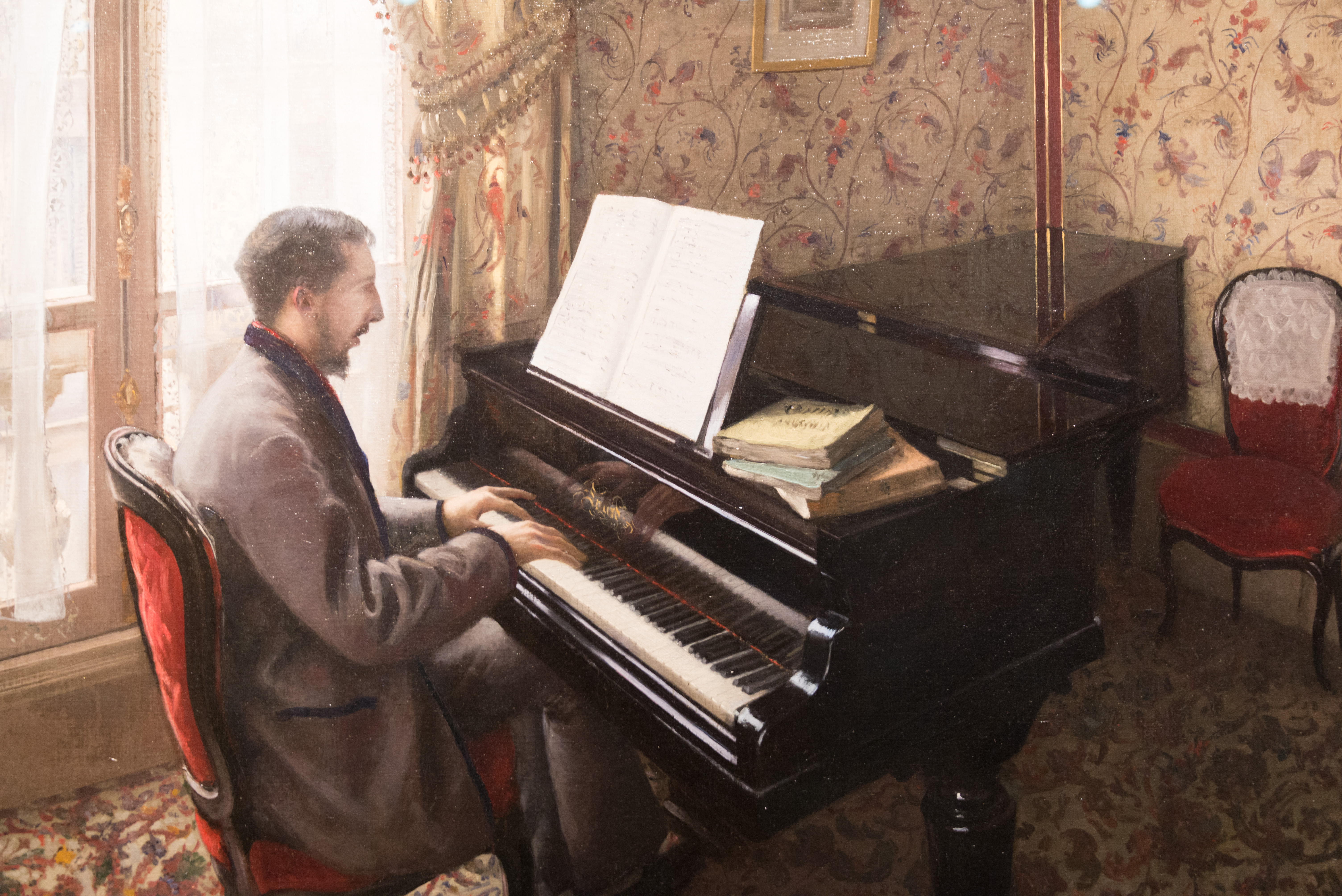 Стоять около рояли. Гюстав Кайботт молодой человек. Пианисты 19 века. Человек за роялем. Человек за пианино.
