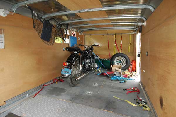 How do you mount a motorcycle tow-behind trailer?