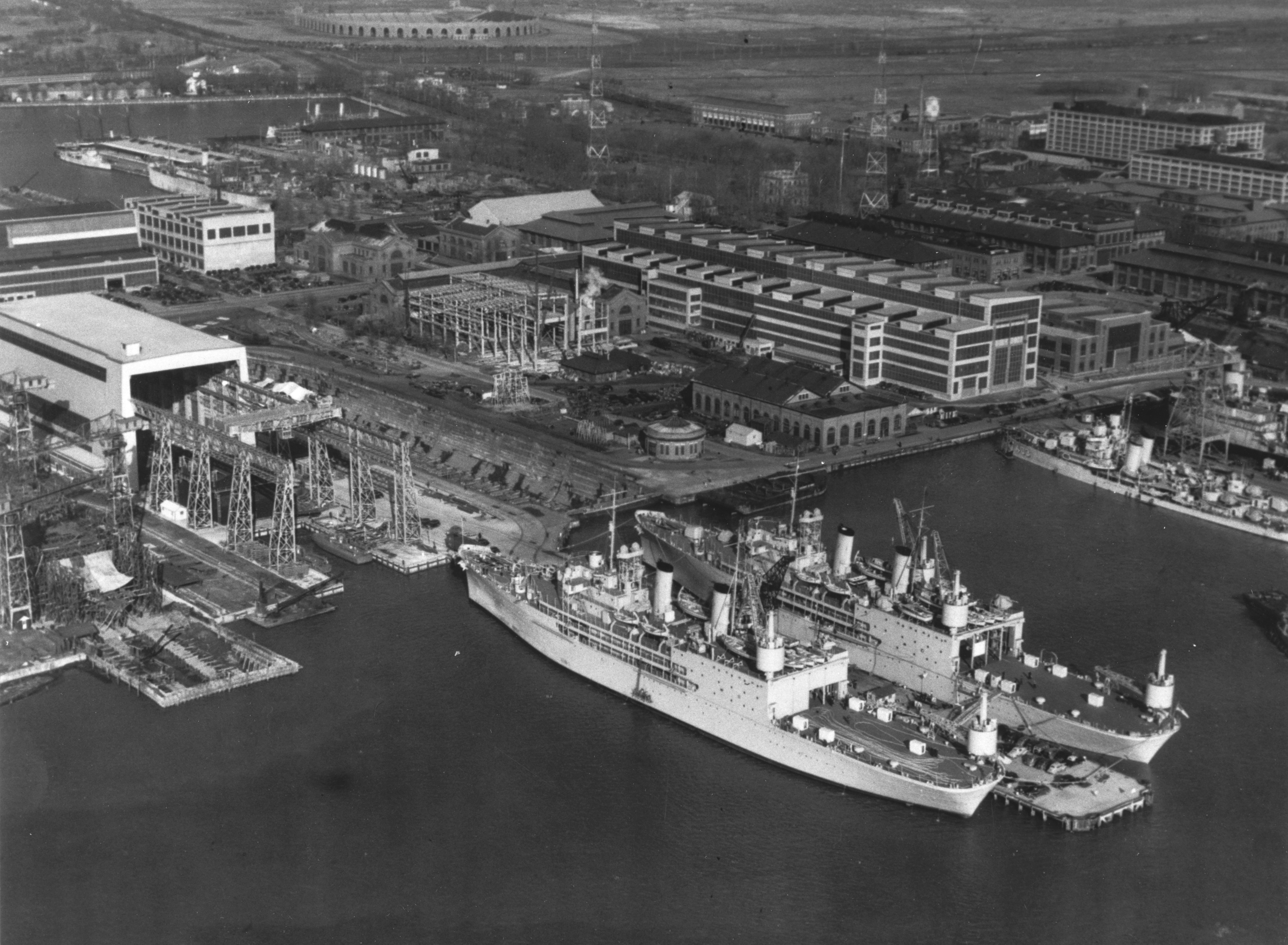 USS Albemarle (AV-5) and USS Curtiss (AV-4) fitting out at the Philadelphia...