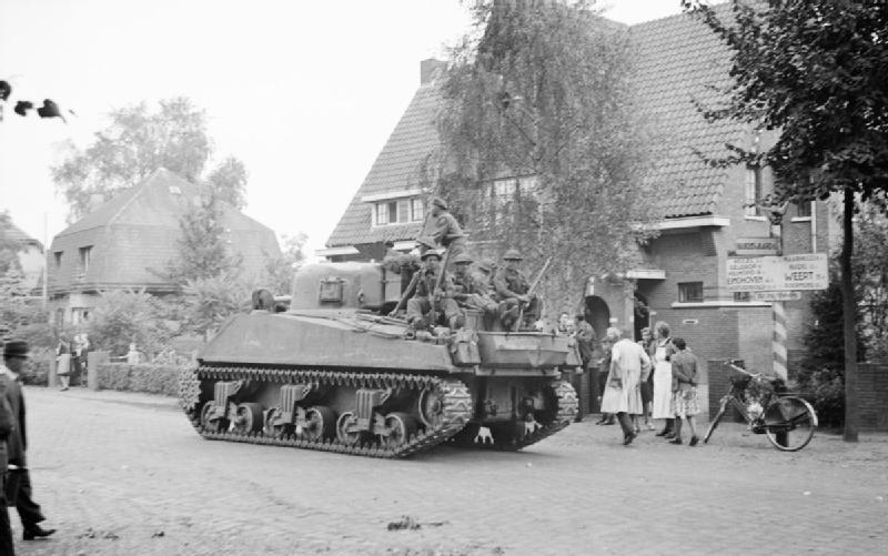 File:A Sherman tank of 11th Armoured Division passing through Leende, Holland, 22 September 1944. B10255.jpg