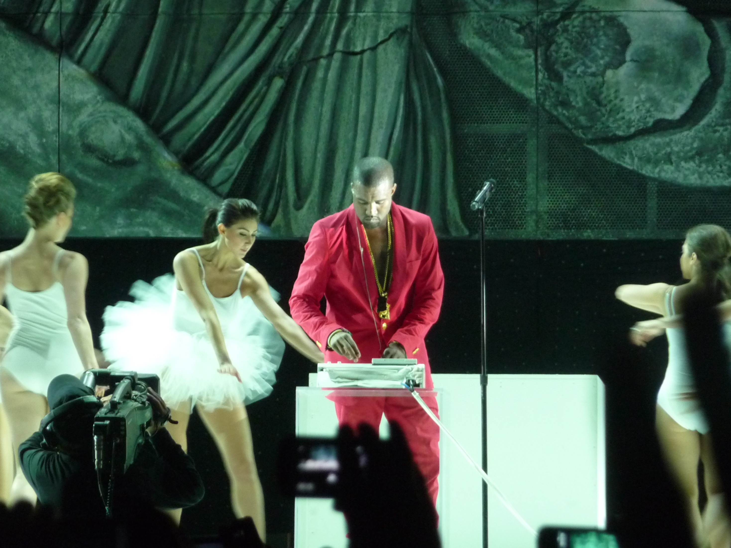 Kanye West and Pharrell Williams vibing front row at Louis