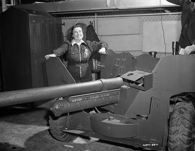 File:Mabel Irven with 6-pounder gun at Dominion Engineering Works 1942 LAC 3196192.jpg