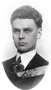 Formal photo portrait of Diefenbaker at age 23. His short dark hair is very thick and curly and has been combed back smoothly, and his face is thinner than at an older age. He is formally dressed with a stiffened shirt collar and wears an academic hood. Picture is inscribed "J.G. Diefenbaker, law".
