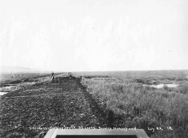 File:Looking south at workers preparing grade through swampy ground, probably near Fairbanks, Alaska, July 1919 (AL+CA 5742).jpg