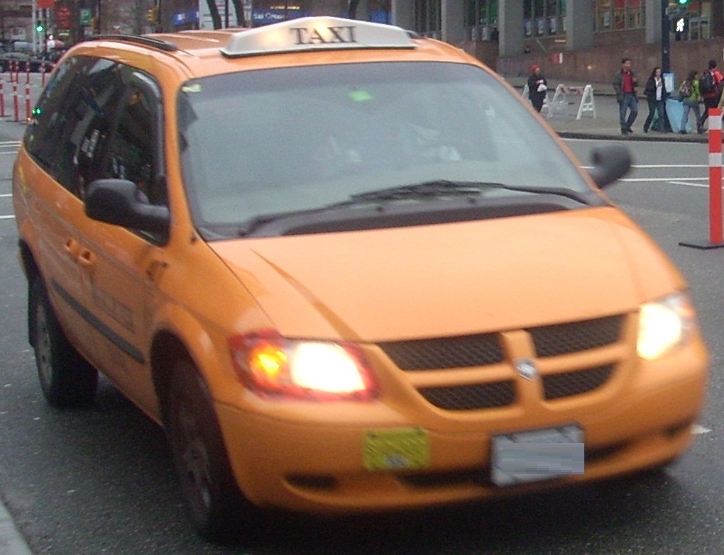 Dodge Caravan Taxi. Оранжевое такси. Ванкувер такси. Dodge Caravan 2001 такси фото.