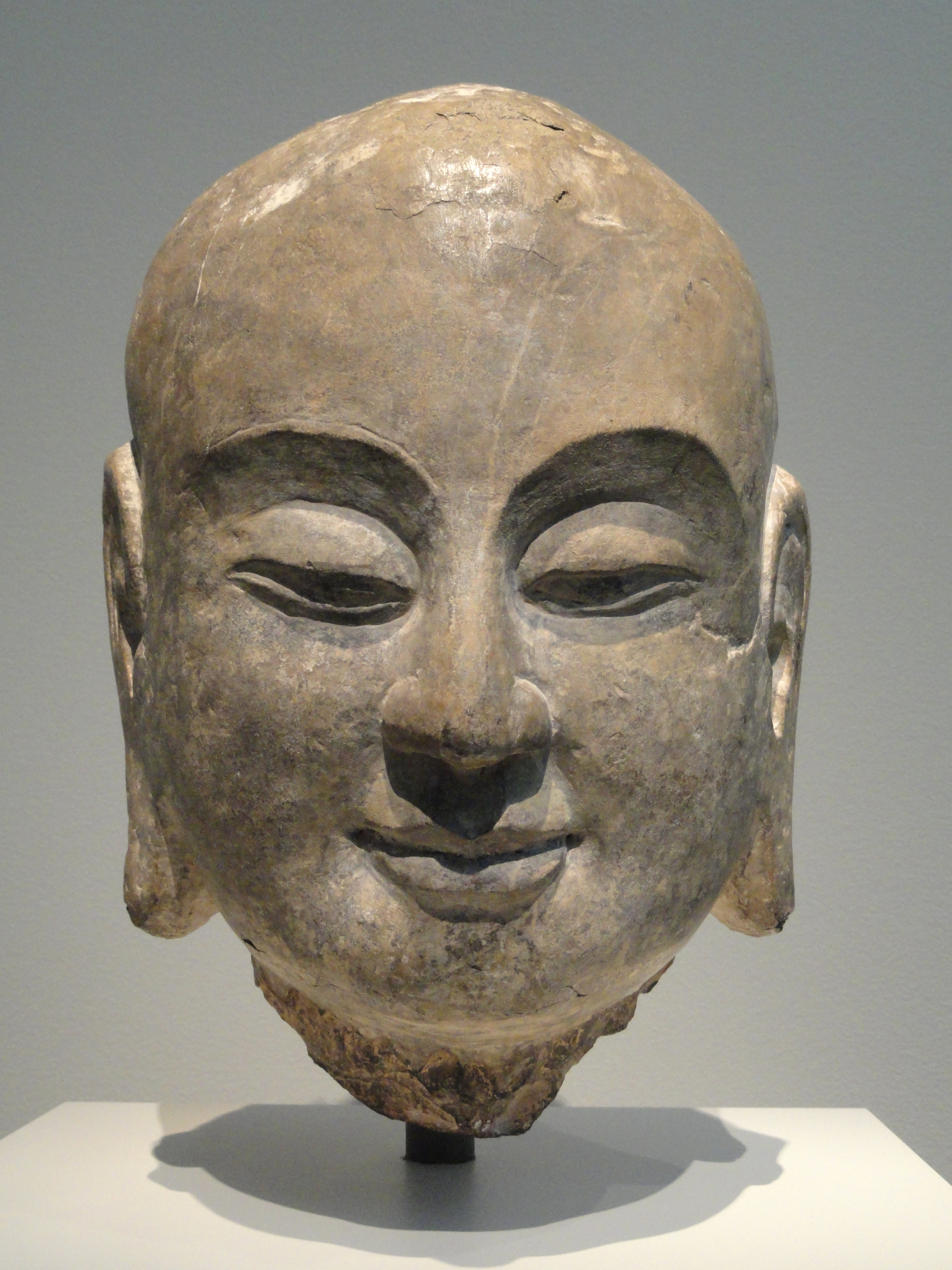 Head of Ānanda, once part of a limestone sculpture from the northern [[Xiangtangshan Caves]]. [[Northern Qi]] dynasty, 550{{en dash}}577 CE.