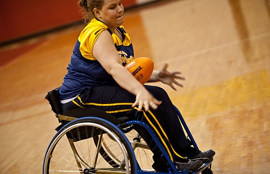 File:Manual Wheelchair Football Player.JPG