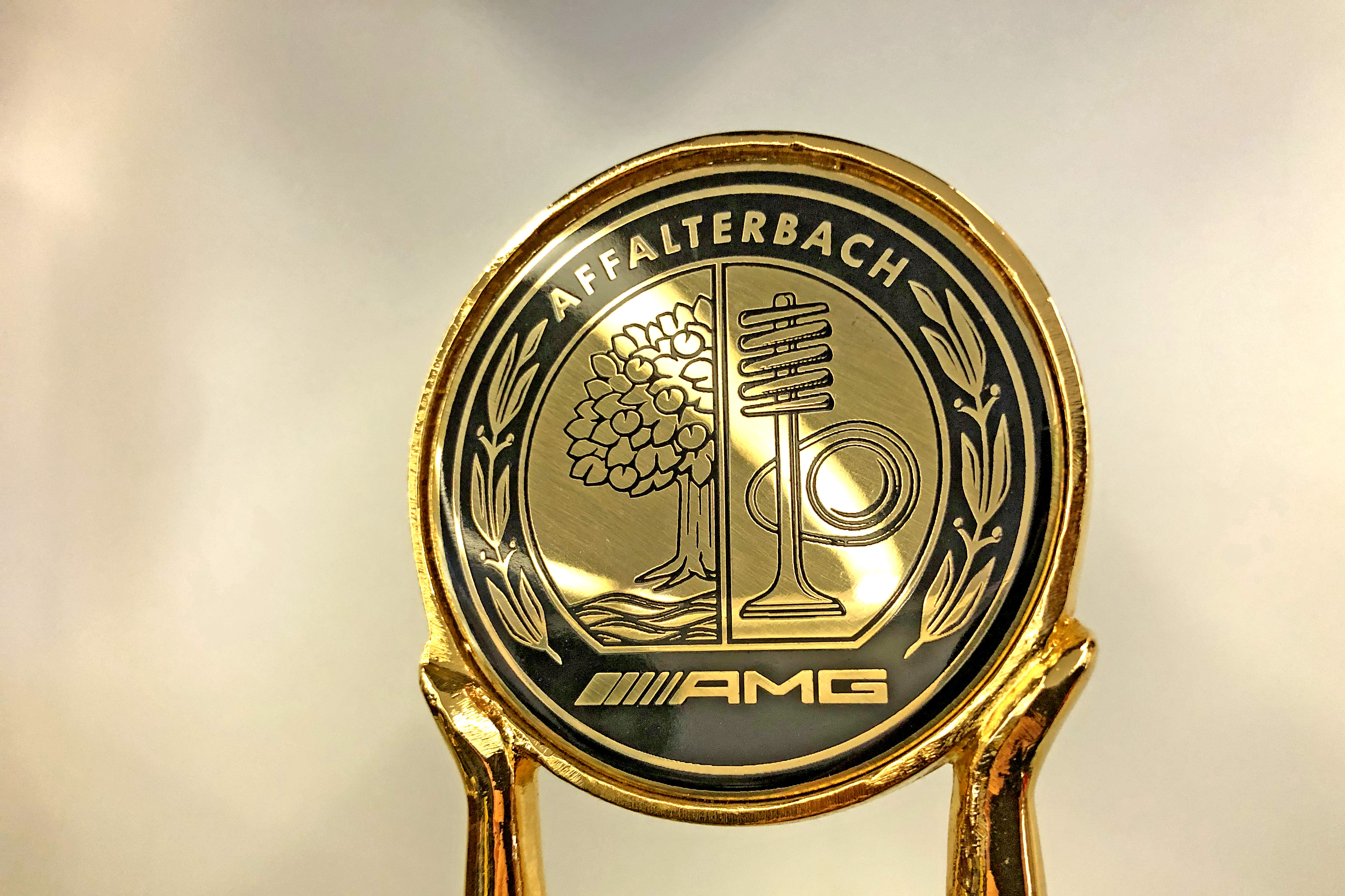 AMG logo : histoire, signification et évolution, symbole