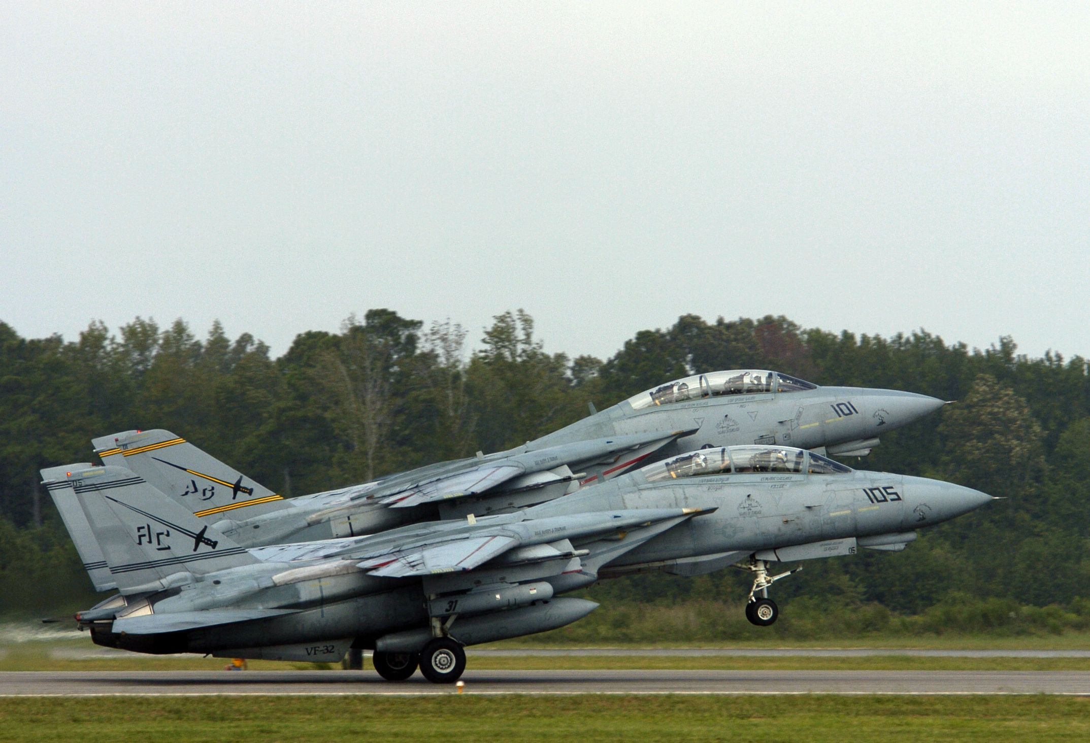US Navy 050916-N-0295M-138 Two F-14B Tomcats perform a section takeoff.jpg.
