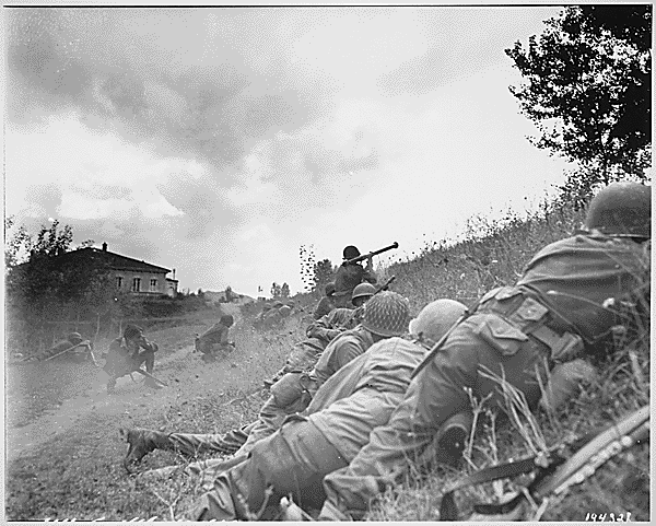 File:"This Negro combat patrol advanced three miles north of Lucca (furthermost point occupied by American troops) to contact an enemy machine gun nest. Here a bazooka-man cuts loose at the target some 300 yards distant." - NARA - 531216.gif