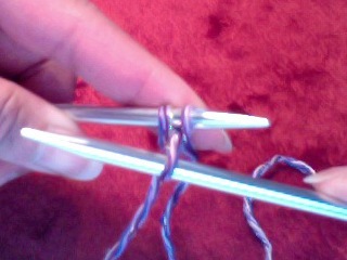 File:Cable-caston-pull-yarn-throught-stitches.jpg