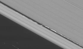 File:Daphnis and ripple shadows N00133497 crop.png
