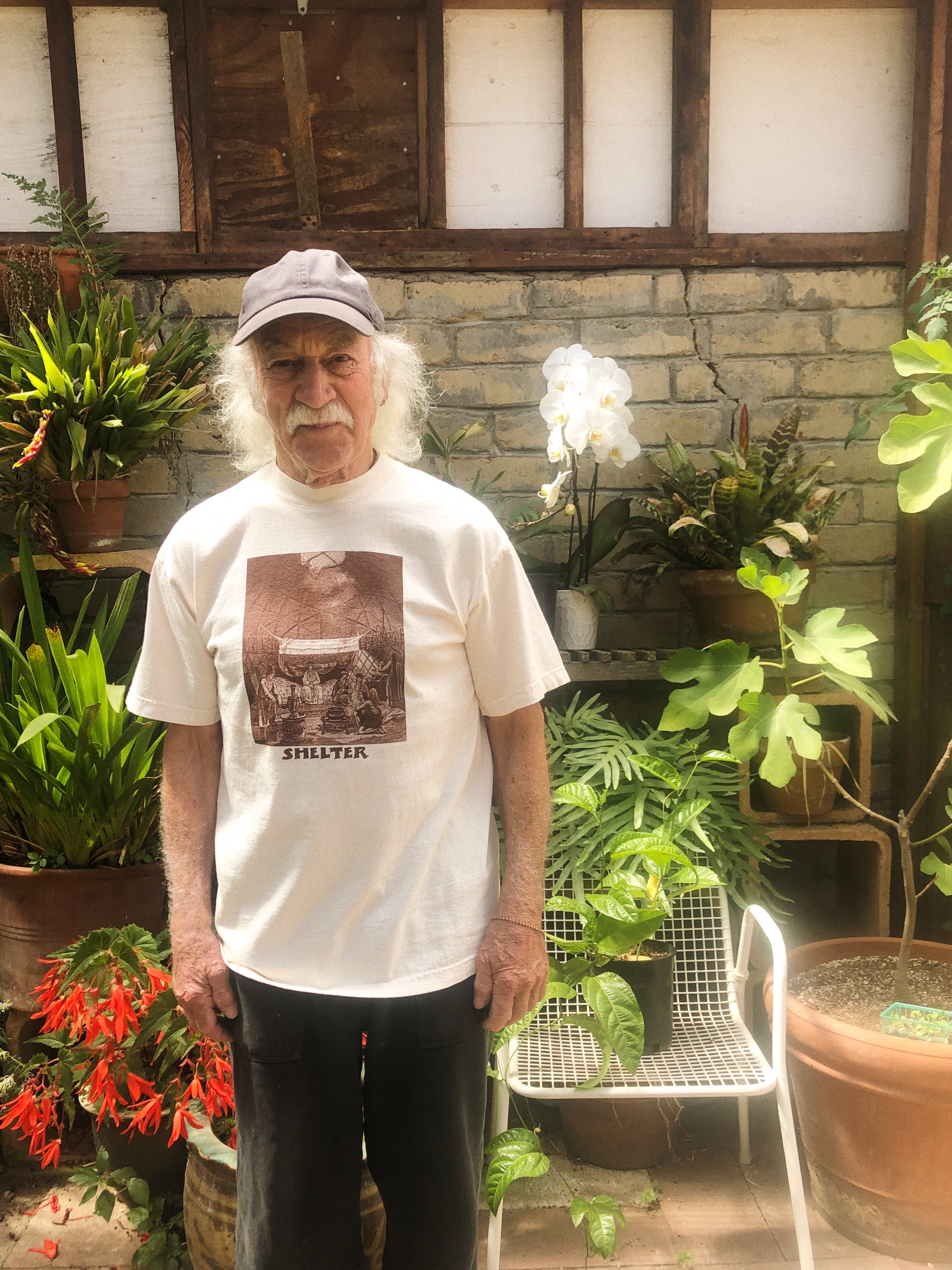 Lloyd Kahn (2021) in his greenhouse