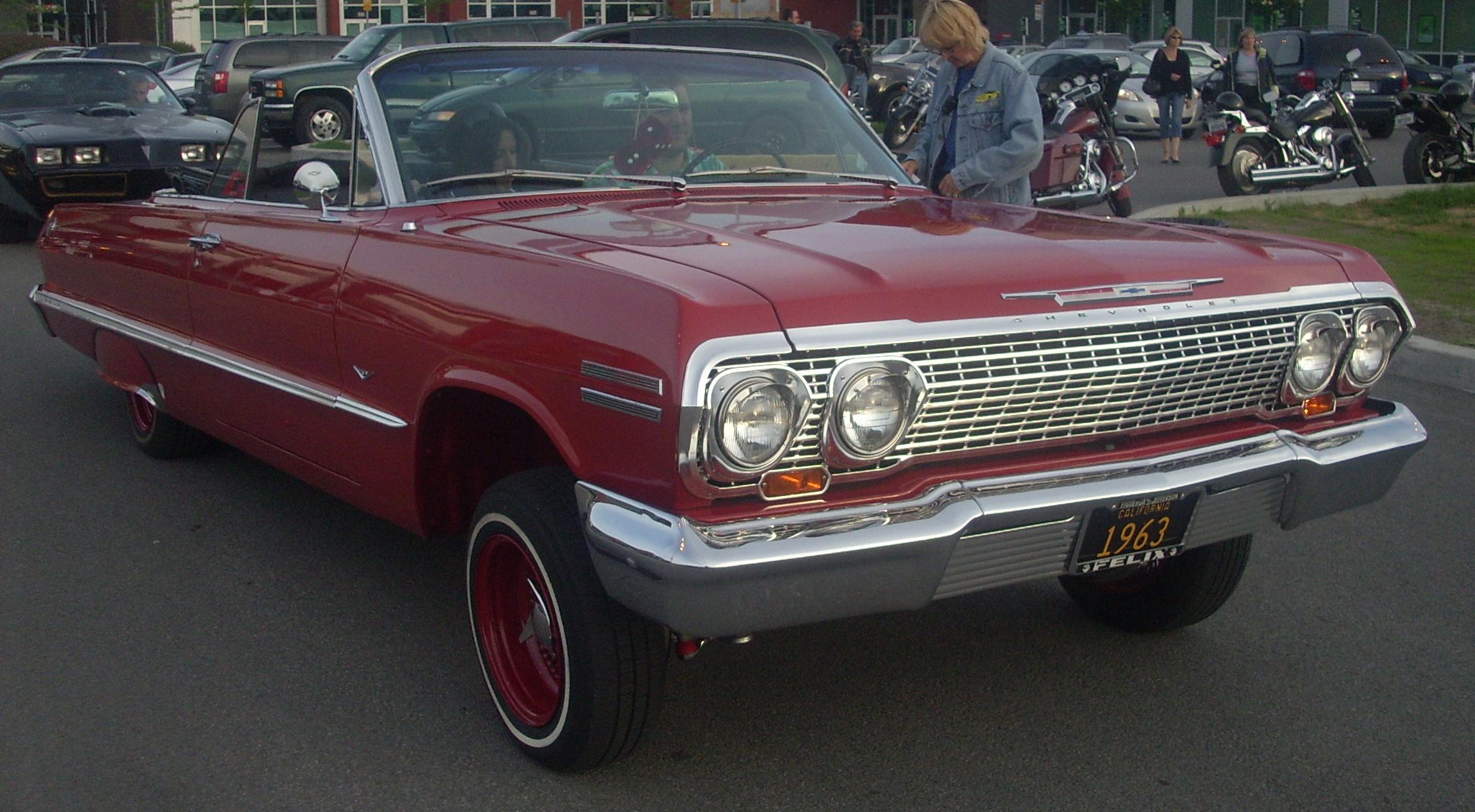 http://upload.wikimedia.org/wikipedia/commons/7/7b/'63_Chevrolet_Impala_Convertible_(Centropolis_Laval_'10).jpg