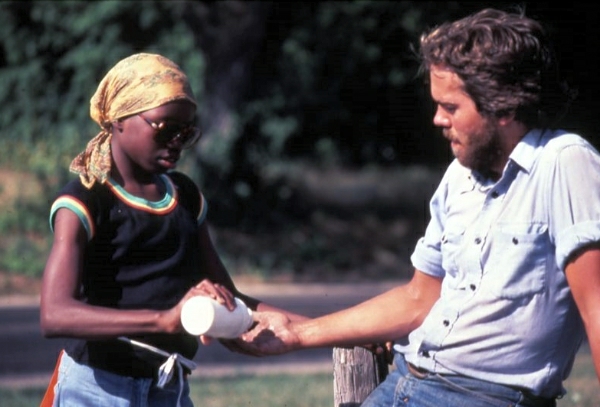 File:A Biker Shares Her Water at Camp DeWolfe, 1980 (14379944087).jpg