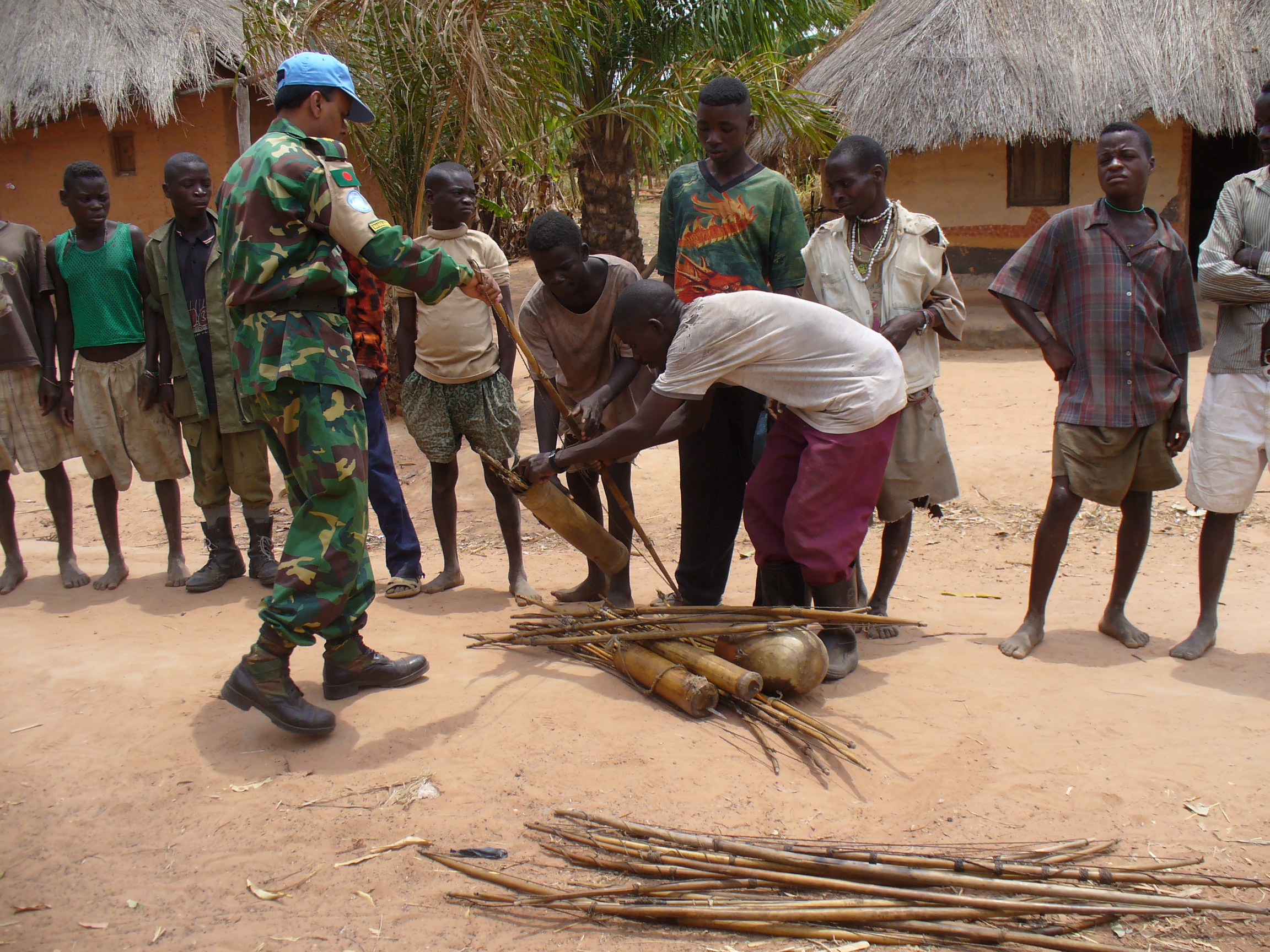 Mai-Mai fighters surrendering their weapons to United Nations personnel in Northern Katanga, 2006.