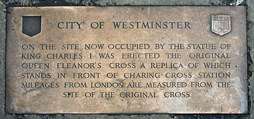 Plaque by the statue of Charles I, stating that "Mileages from London are measured from the site of the original Cross"