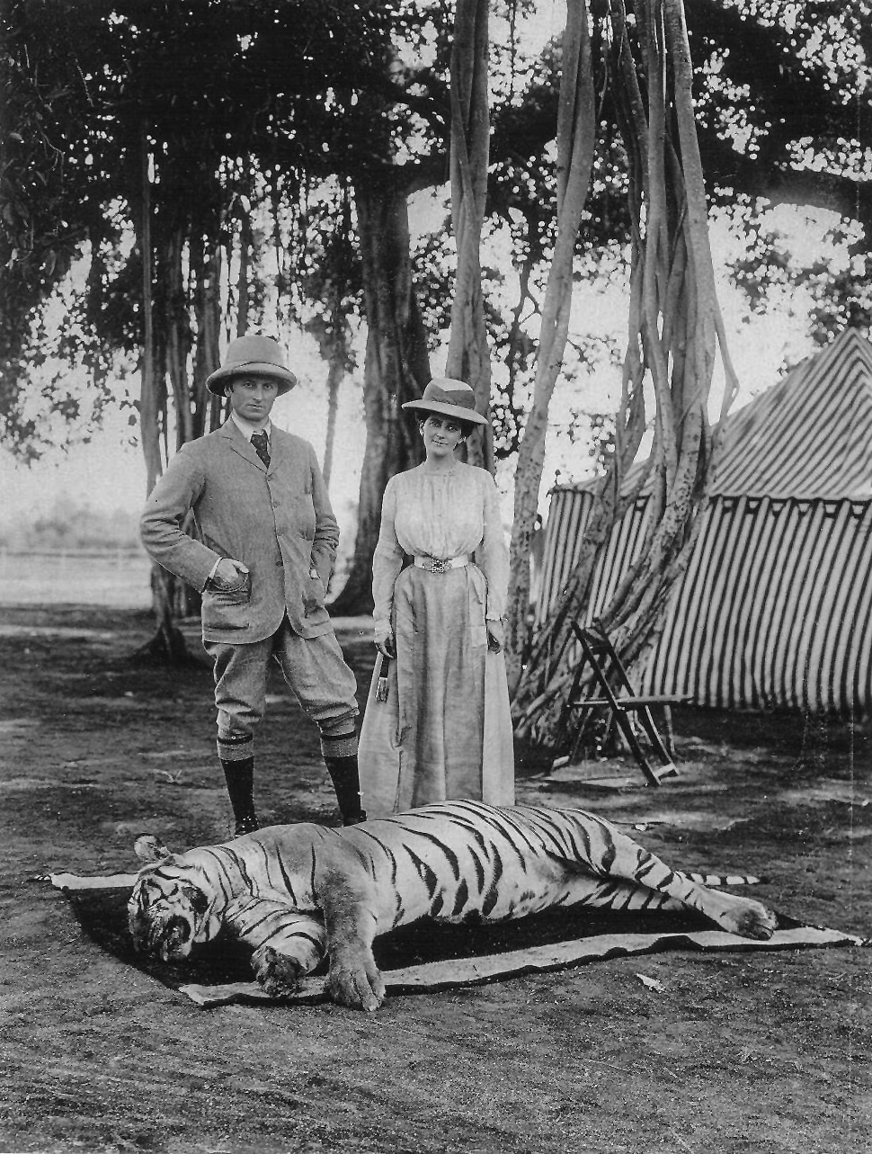 George Curzon with his wife posing with a hunted Bengal tiger%2C 1903