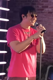 Joji Performing Live in 2018 (cropped).png