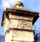 One of a pair of surviving piers of the entrance gate to Wanstead House, with the monogram of Richard Child WansteadGate.jpg