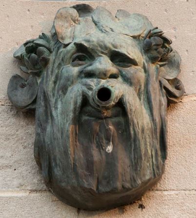 File:2019 SMM-Omaha copper Green man exterior under north rose window.jpg