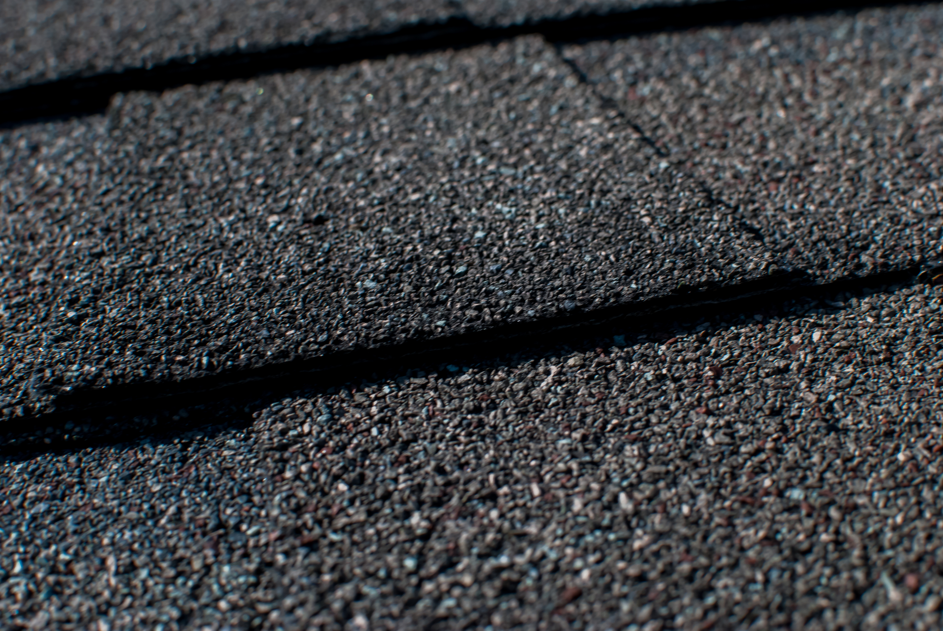 Up close image of grey roof shingles