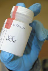 Drug test specimen bottle: Frangible security label detects tampering or altering of the specimen.
