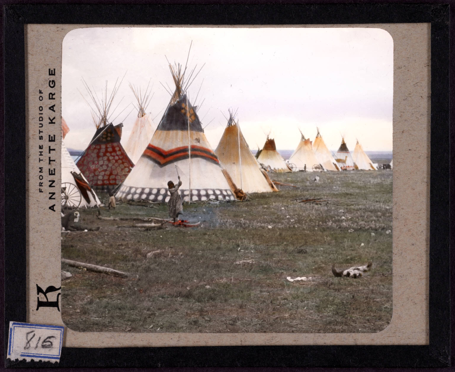 http://upload.wikimedia.org/wikipedia/commons/8/80/-Woman_chopping_firewood%2C_Eagle_tipi_in_foreground%2C_Star_tipi_on_left-._815.jpg